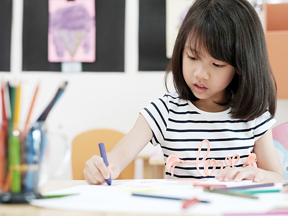 Child colouring in kids research_crop